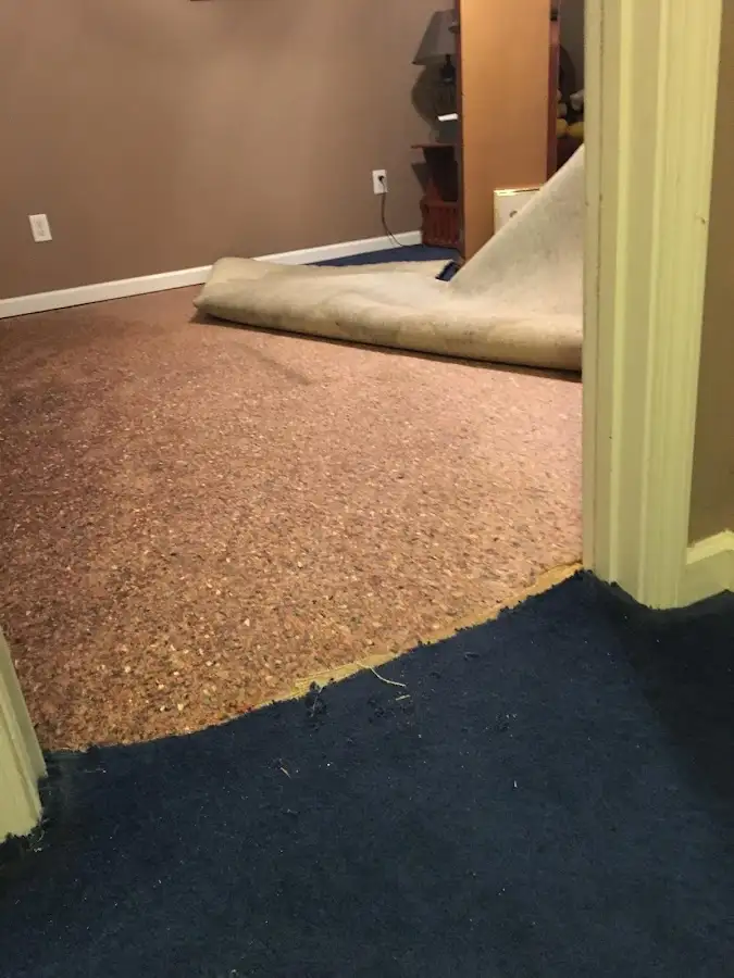 Carpet pad removal revealing water damage during Water Mitigation Services in Ben Lomond
